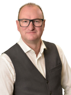 Headshot of Chris Romans